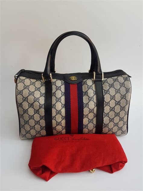 gucci purse navy blue|gucci boston bag blue.